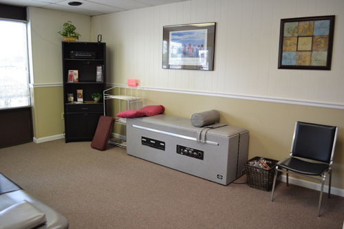 Treatment room with an intersegmental traction table, from the original Lionville Chiropractic website